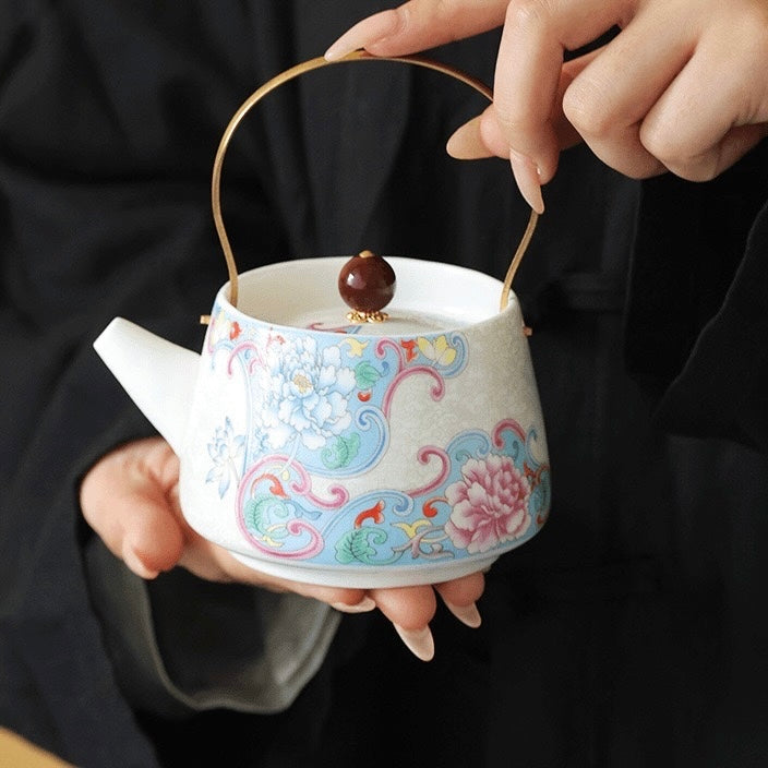 Teapot 001. White and blue fancy and classic flower pattern teapot.