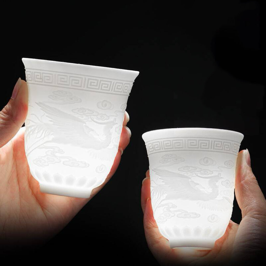 M015. Goat jade white porcelain carving dragon and phoenix teacup